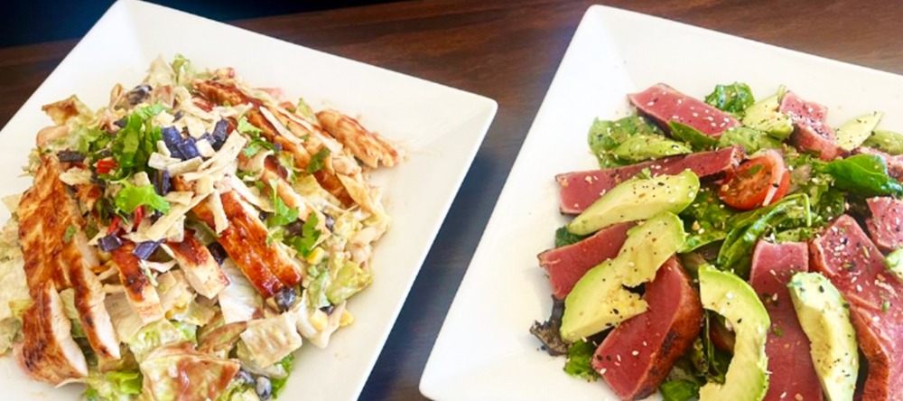 BBQ chicken chopped salad and a seared ahi and avocado salad
